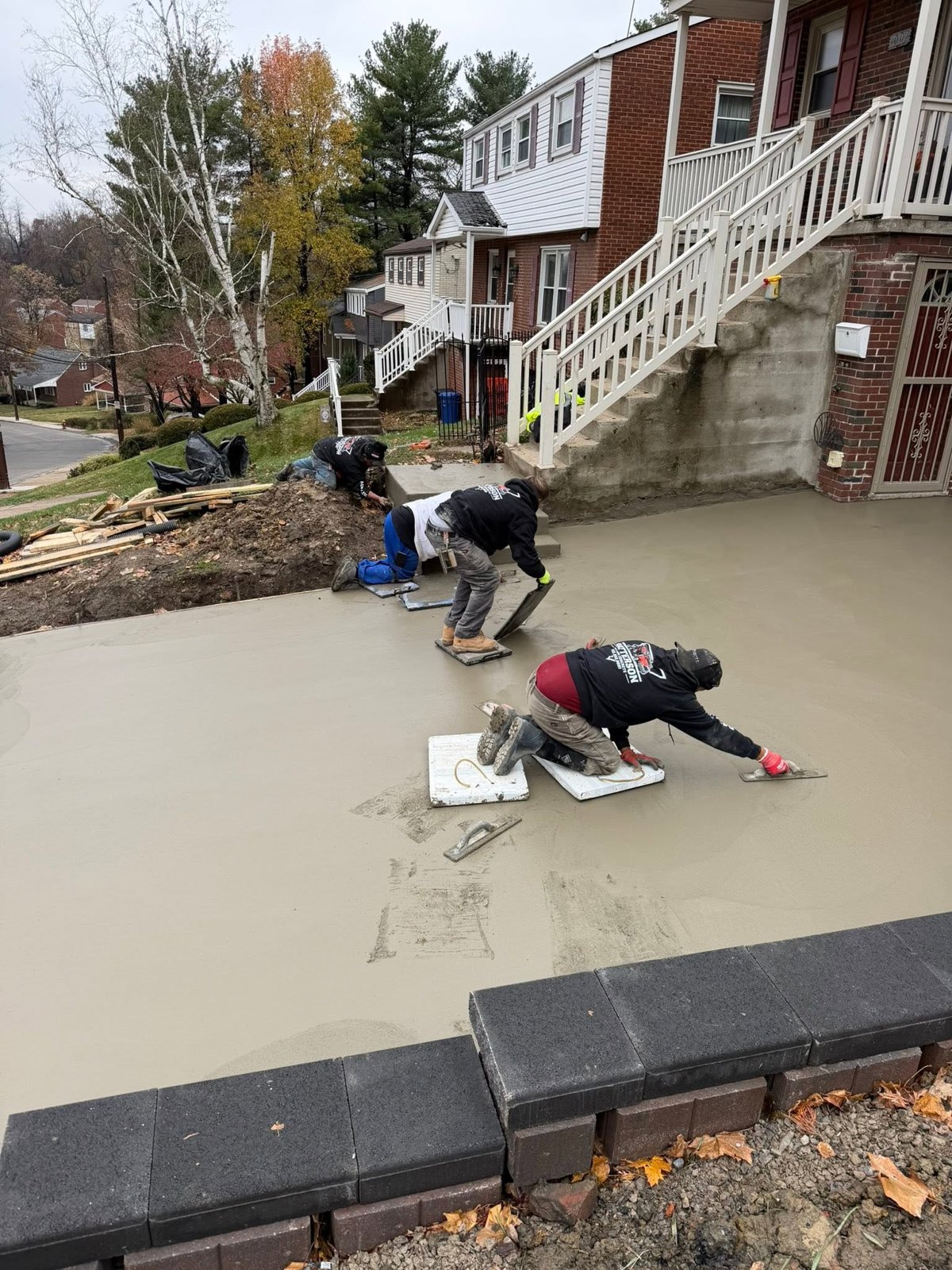 Patterson crew troweling