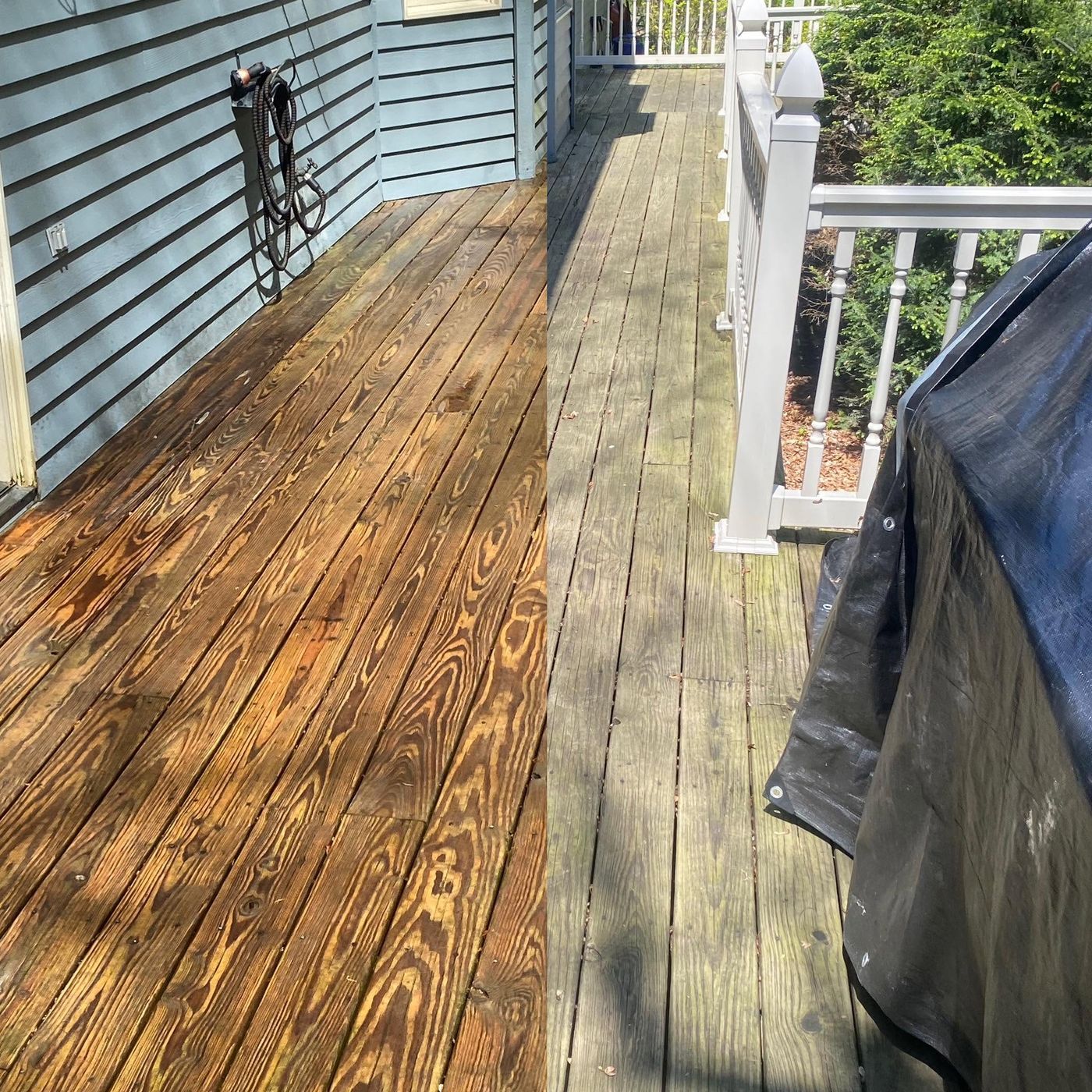 Composite deck half washed, showing the clean line between washed and unwashed boards